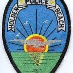 A police patch on a white background