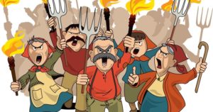 Angry villagers holding torches and pitchforks in protest.